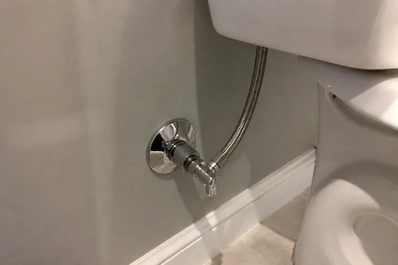 Bathroom plumbing fixtures and work area