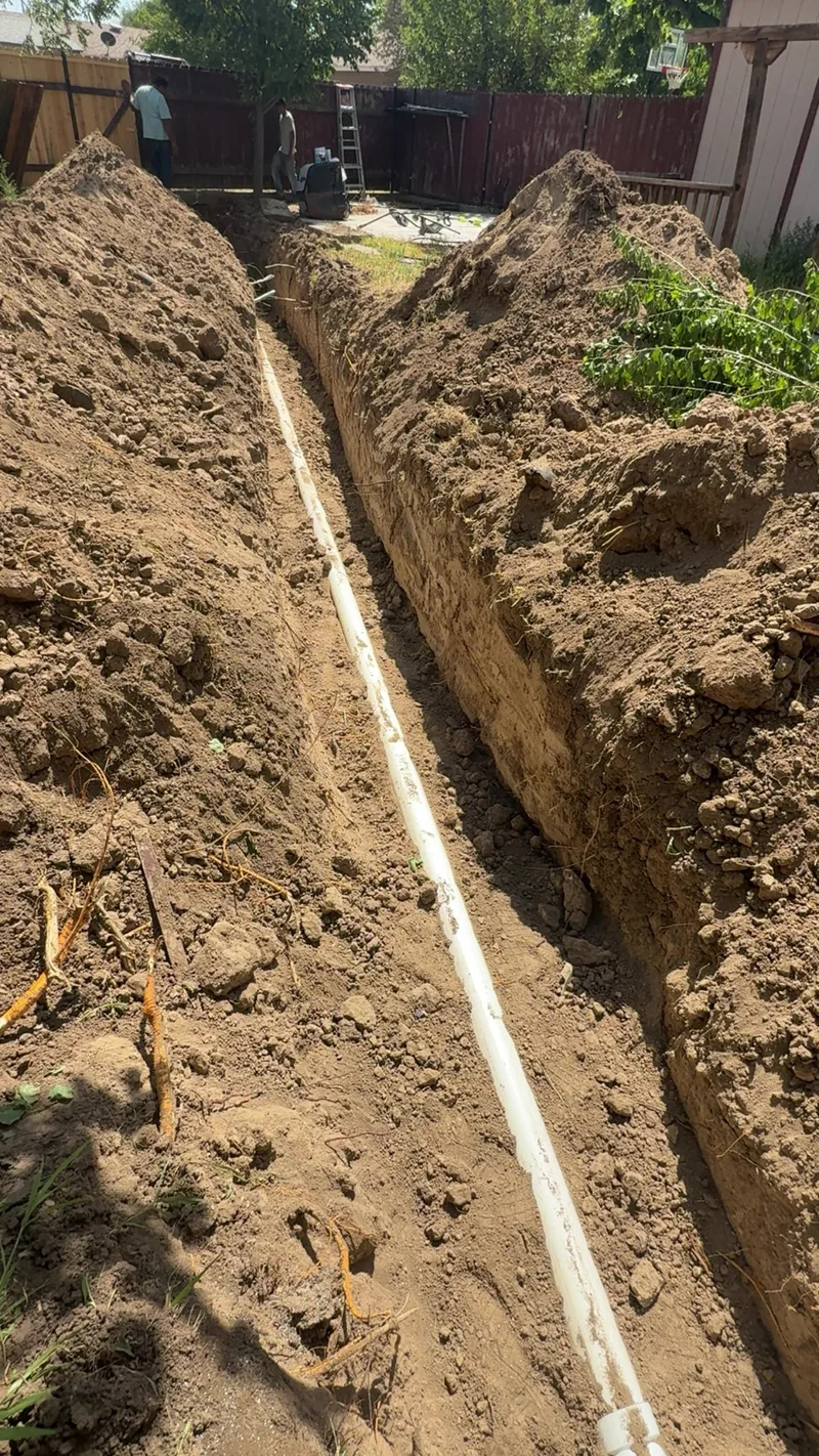 NextGen Plumbing trench water pipe installation in progress