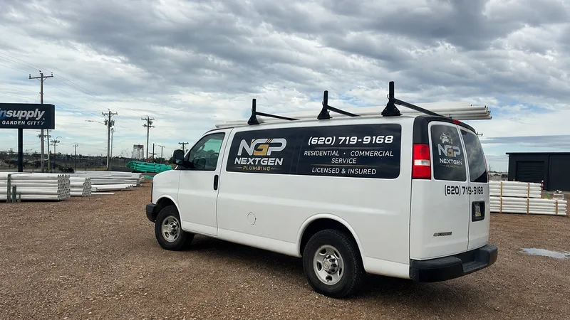 NextGen Plumbing service van parked at a Garden City Kansas job site